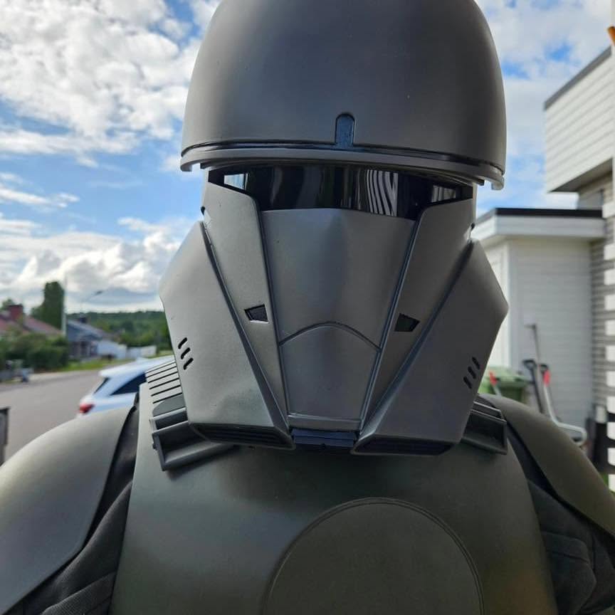 Finished ICAT helmet in matte black/grey with tinted visor and side vents